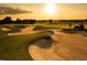 Scenic view of a golf course at sunset at 16914 Vinci Way, Bella Collina, FL 34756