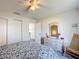 Bedroom with double bed, dresser, and rocking chair at 17439 Se 93Rd Vine Ave, The Villages, FL 32162