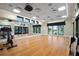 Tranquil yoga studio with wood floors and large windows at 1809 Tropical Palms Cir, Kissimmee, FL 34747