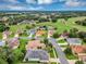 Wide aerial view of the community and golf course at 26934 Camerons Run, Leesburg, FL 34748