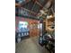 Workshop with display cabinets and a hutch at 3140 Se 23Rd Pl, Sumterville, FL 33585