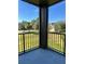 Screened balcony with views of green space at 420 Summit Ridge Pl # 214, Longwood, FL 32779