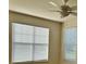 Bright bedroom with large windows, blinds, and neutral walls at 420 Summit Ridge Pl # 214, Longwood, FL 32779