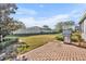 Large backyard with patio and privacy fence at 504 Narrow View Ln, Groveland, FL 34736