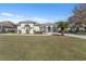 Beautiful one-story house with a manicured lawn at 5060 Greenbriar Trl, Mount Dora, FL 32757