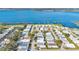 Aerial view of mobile home community by the lake at 6624 Westchester Ne Dr, Winter Haven, FL 33881