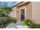 Front entrance with holiday decorations and a welcoming walkway at 9033 Saint Andrews Way, Mount Dora, FL 32757