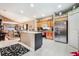 Modern kitchen with stainless steel appliances and granite countertops at 9033 Saint Andrews Way, Mount Dora, FL 32757