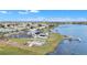 Community amenities including pool, shuffleboard, and lake access at 1435 Mohawk Cir, Tavares, FL 32778