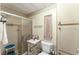 Bathroom with shower, toilet, and vanity at 1435 Mohawk Cir, Tavares, FL 32778