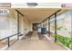 Covered carport with storage area and side garden at 1435 Mohawk Cir, Tavares, FL 32778