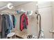 Large walk-in closet with double hanging rods and shelving at 1435 Mohawk Cir, Tavares, FL 32778