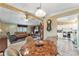Open concept dining area with views into living room and kitchen at 1435 Mohawk Cir, Tavares, FL 32778