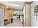 View of kitchen with ample counter space and built-in microwave at 1435 Mohawk Cir, Tavares, FL 32778