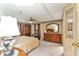 Comfortable main bedroom with plenty of closet space at 1435 Mohawk Cir, Tavares, FL 32778