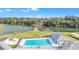 Community pool with lake view and gazebo at 1435 Mohawk Cir, Tavares, FL 32778