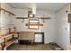 Empty storage room with shelving and a window at 1435 Mohawk Cir, Tavares, FL 32778