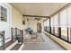 Relaxing sunroom with seating and view at 1435 Mohawk Cir, Tavares, FL 32778