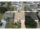 Aerial view of a neighborhood showing a home's location and surrounding houses at 1443 Greenville Way, The Villages, FL 32162