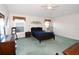 Comfortable bedroom with carpeted floors and ample closet space at 1443 Greenville Way, The Villages, FL 32162