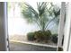 Private patio with small, well-maintained landscaping at 1443 Greenville Way, The Villages, FL 32162