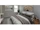 Spacious bedroom with plush bed and neutral decor at 16436 Hamlin View St, Winter Garden, FL 34787