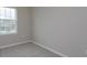 Bright bedroom with neutral walls and carpeted floors at 16436 Hamlin View St, Winter Garden, FL 34787