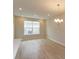 Bright dining room with hardwood floors and a chandelier at 16436 Hamlin View St, Winter Garden, FL 34787