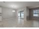 Dining area with tile floors, sliding glass doors, and chandelier at 1724 Point O Woods Ct, Mount Dora, FL 32757