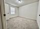 Simple bedroom with carpet and window at 209 Hyacinth Ct, Kissimmee, FL 34759