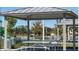 Relax under the covered picnic pavilion with tables and benches at 209 Hyacinth Ct, Kissimmee, FL 34759