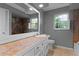 Bathroom with tiled floor and vanity at 21621 Lake Seneca Rd, Eustis, FL 32736