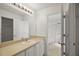 Bathroom with single sink vanity and shower/tub combo at 2514 Raintree Dr, The Villages, FL 32162