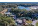 Property overview, showcasing the house and surroundings at 316 Amanda Ln, Leesburg, FL 34748