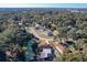 Neighborhood view with house and pool at 316 Amanda Ln, Leesburg, FL 34748