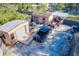 Multiple storage sheds and a truck in the backyard at 316 Amanda Ln, Leesburg, FL 34748