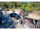 Backyard with truck, sheds, and covered vehicles at 316 Amanda Ln, Leesburg, FL 34748