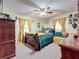 Bright bedroom featuring a full-size bed and ample natural light at 316 Amanda Ln, Leesburg, FL 34748