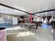Spacious game room with pool table and dining area at 316 Amanda Ln, Leesburg, FL 34748