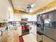 Cozy kitchen featuring stainless steel appliances and ample counter space at 316 Amanda Ln, Leesburg, FL 34748