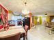 Open concept kitchen with a view of the dining area and living room at 316 Amanda Ln, Leesburg, FL 34748