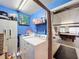 Laundry room with washer, dryer, and additional storage at 316 Amanda Ln, Leesburg, FL 34748