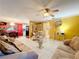 Open concept living room with views into the dining area and kitchen at 316 Amanda Ln, Leesburg, FL 34748