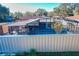 Large screened pool area with covered patio and fenced backyard at 316 Amanda Ln, Leesburg, FL 34748