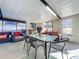 Bright sunroom with seating and dining areas at 316 Amanda Ln, Leesburg, FL 34748