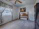 Bedroom with wood bed frame, carpeting, and window coverings at 32619 Oak Park Dr, Leesburg, FL 34748