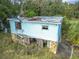 Damaged house requiring repairs, seen from above at 4235 Dove Valley Ln, Lady Lake, FL 32159