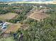 Aerial view of property with large lot and nearby lake at 4235 Dove Valley Ln, Lady Lake, FL 32159