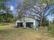 Rustic detached garage needing some repairs at 4235 Dove Valley Ln, Lady Lake, FL 32159