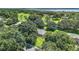 Aerial view showing home's location on a large lot within a community at 6147 Spinnaker Loop, Lady Lake, FL 32159